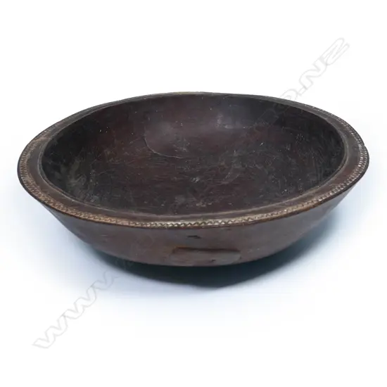A large vintage PNG/Trobriand Islands wooden food bowl,